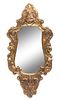 * An Italian Baroque Style Giltwood Mirror Height 29 x width 13 1/2 inches.