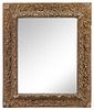 * A Northern Italian Carved Wood Mirror Height 31 1/2 x width 26 3/4 inches.