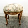 A French Provincial Stool Height 18 x width 17 1/2 inches.