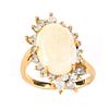 Vintage Approx. 5.0 Carat Oval Cabochon Opal, 1.25 Carat Diamond and 14 Karat Yellow Gold Ring