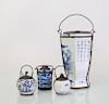 GROUP OF FOUR CHINESE METAL-MOUNTED BLUE AND WHITE PORCELAIN OPIUM POTS WITH PIPE STEMS