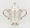 GEORGE V SILVER TWO-HANDLED TROPHY CUP AND COVER