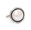 An Antique Platinum, Natural Pearl and Onyx Ring, 4.10 dwts.