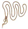 A Victorian Yellow Gold Longchain with Agate Cameo, Seed Pearl and Enamel Slide Pendant, 33.70 dwts.