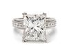 A Platinum and Diamond Ring, one princess cut diamond 10.03 cts, 18 round 0.09 cts. GIA Cert Number 6197093042 9.90 dwts.