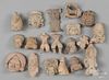 Group of pre-Columbian style pottery relics.