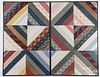 Four framed pieced quilt fragments