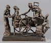 Phillip Ratnor sculpture of a shoe cart & figures