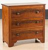Diminutive walnut and pine chest of drawers