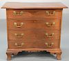 Chippendale mahogany oxbow chest having shaped overhanging top over four oxbow drawers on carved apron and large ogee carved