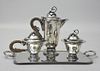 Three piece Mexican silver tea service with a silver plated tray by Christofle
