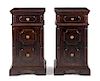 A Pair of Italian Renaissance Style Walnut Side Cabinets Height 39 1/4 x width 22 x depth 13 3/4 inches.