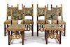 * A Set of Six Italian Baroque Parcel Gilt Walnut Side Chairs Height 44 3/4 inches.