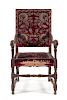 * A Spanish Baroque Walnut Armchair Height 43 1/4 inches.