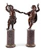 A Pair of Italian Carved Oak Figures Height of taller 54 1/4 inches.