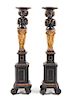 A Pair of Venetian Painted and Gilt Figural Pedestals Height 53 1/2 inches.