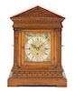 A German Oak Musical Mantel Clock Height 17 7/8 inches.