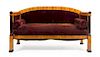 * A Biedermeier Parcel Ebonized Birch Sofa Height 39 x width 67 inches.