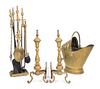 A Neoclassical Brass Fire Fender and Fireplace Tools Width of fire fender 53 inches.