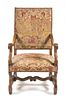 A Henry II Style Walnut Library Chair Height 43 1/4 inches.