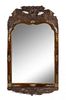 A Rococo Style Parcel Gilt Carved Mirror Height 32 1/4 x width 18 1/2 inches.