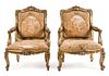 A Pair of Louis XV Style Giltwood Fauteuils Height 42 1/2 inches.
