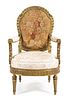 A Louis XVI Style Giltwood Fauteuil Height 46 inches.