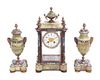 A French Gilt Bronze, Onyx and Champleve Clock Garniture Height of mantel clock 16 inches.