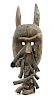* A Toma Wood and Boar's Tusk Mask Height 28 inches.