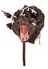 * A Senufo Wood and Raffia Mask and Costume Length overall 102 inches.