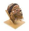 * A Pende Wood and Raffia Initiation Ceremony Mask Height 13 3/4 inches.