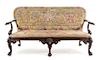 A George II Style Mahogany Settee Height 40 1/2 x width 73 1/2 inches.