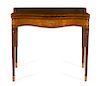 A George III Marquetry and Satinwood Inlaid Mahogany Game Table Height 29 1/2 x width 34 3/4 x depth 14 3/4 inches (closed).