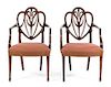 A Pair of George III Mahogany Armchairs Height 37 inches.