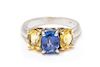 A 14 Karat Bicolor Gold and Sapphire Ring, 3.30 dwts.