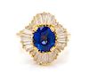 * An 18 Karat Yellow Gold, Sapphire and Diamond Ballerina Ring, 4.70 dwts.