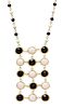 A 14 Karat Yellow Gold, Black and White Onyx Necklace, Italian, 10.10 dwts.
