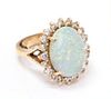 A Yellow Gold, Opal and Diamond Ring, 4.20 dwts.