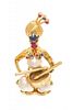 A 14 Karat Yellow Gold, Sapphire, Ruby and Cultured Mabe Pearl Genie Playing the Drums Brooch, 7.90 dwts.