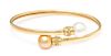 A 14 Karat Yellow Gold, Cultured South Sea Pearl and Diamond Bangle Bypass Bracelet, 7.80 dwts.