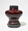 18th C. Chinese oxblood red glaze jar with carved wooden lid