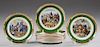Set of Twelve French Porcelain Plates, 20th c., by Gien, with gilt borders around green banding and central reserves of