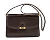 A Gucci Dark Brown Leather Flap Handbag, 8" x 6" x 2"; Strap drop: 14".