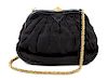A Chanel Black Vintage Silk Evening Bag, 8" x 6" x 2".