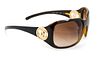 A Pair of Chanel Brown Frame Sunglasses,