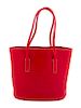 * A Prada Red Leather Perforated Tote Bag, 11" x 9" x 3.5"; Handle drop: 7.5".