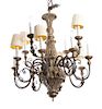 A Twelve-Light Continental Carved Silvered Wood Chandelier Diameter 26 inches.