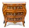 A Louis XV Style Gilt Bronze Mounted Kingwood Bombe Commode Height 33 x width 35 1/2 x depth 20 inches.