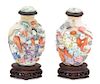 Two Famille Rose Molded Porcelain Snuff Bottles Height 3 inches.