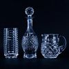 Three (3) Waterford Crystal Tableware. Includes: decanter, pitcher, and cylindrical vase. All signe